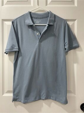 Calvin Klein Light Blue Polo Shirt with Subtle Logo
